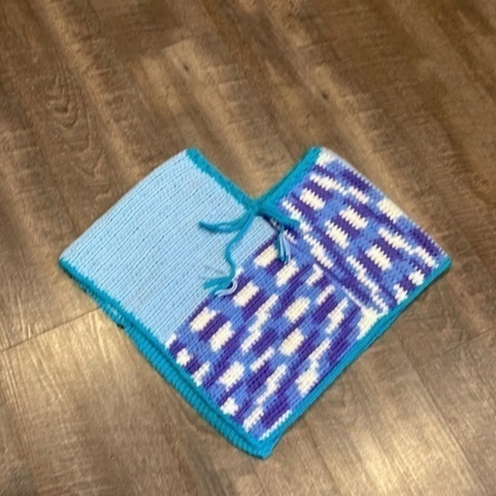 Child’s hand crocheted poncho